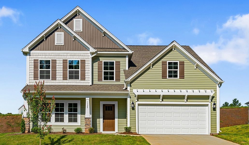 Front exterior of a new home in Brooke Hill, Lewisville, NC, highlighting curb appeal (Image 1).