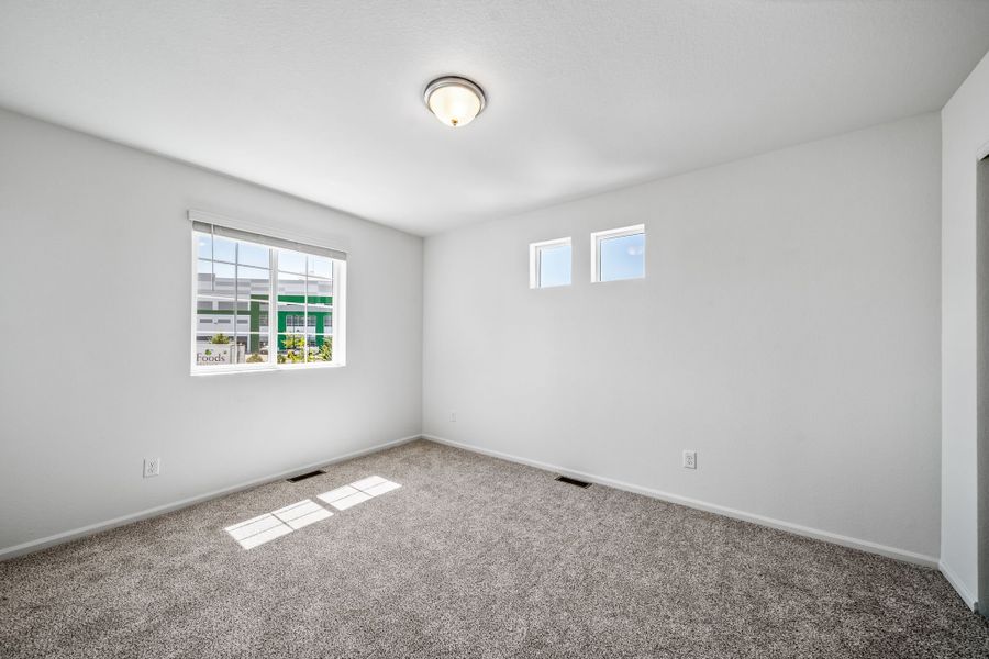 Spacious, unfurnished interior of a new home in Muegge Farms, Bennett (Image 8).