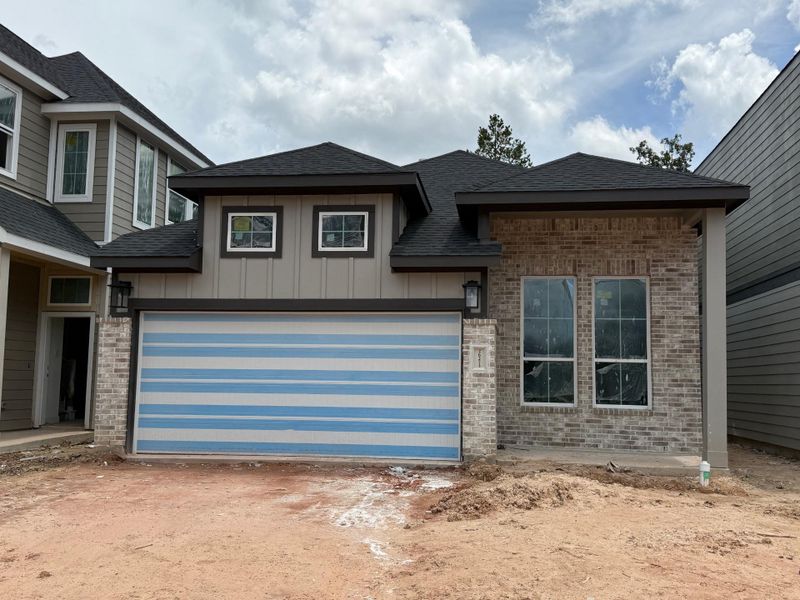 Front exterior of a new home in Kresston, Montgomery, TX, highlighting curb appeal (Image 9). Front exterior of a new home in Kresston, Montgomery, TX, highlighting curb appeal (Image 9).