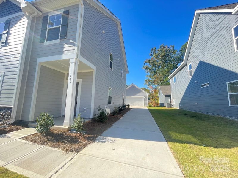 Exterior details and patio area of a home in Arbor Village, Matthews (Image 13).