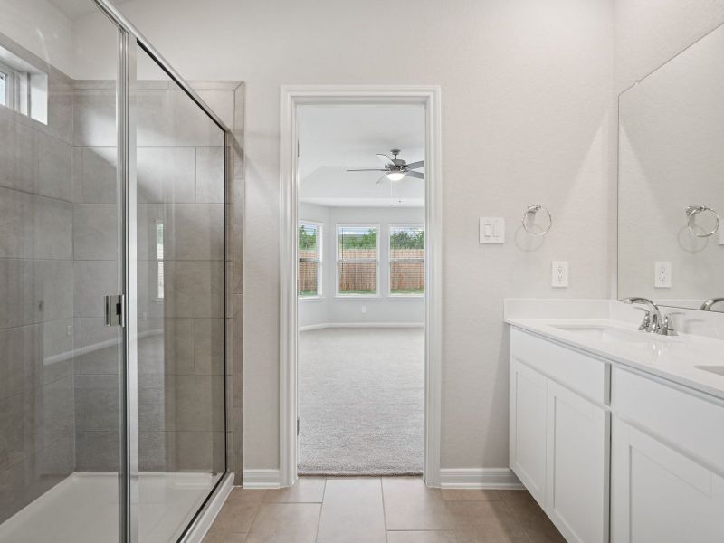 Primary suite bathroom in the Briscoe floorplan at a Meritage Homes community. Primary suite bathroom in the Briscoe floorplan at a Meritage Homes community.
