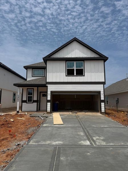 In-progress construction of a new home in River's Edge, Conroe, TX (Image 27).
