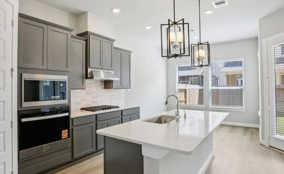 Photo is not of the actual home, but is an inspirational photo of builder’s model home and may depict options, furnishings, and/or decorator features that are not included Photo is not of the actual home, but is an inspirational photo of builder’s model home and may depict options, furnishings, and/or decorator features that are not included