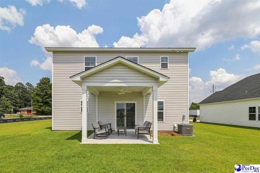 Front exterior of a new home in Southern Columns, Florence, SC, highlighting curb appeal (Image 26).