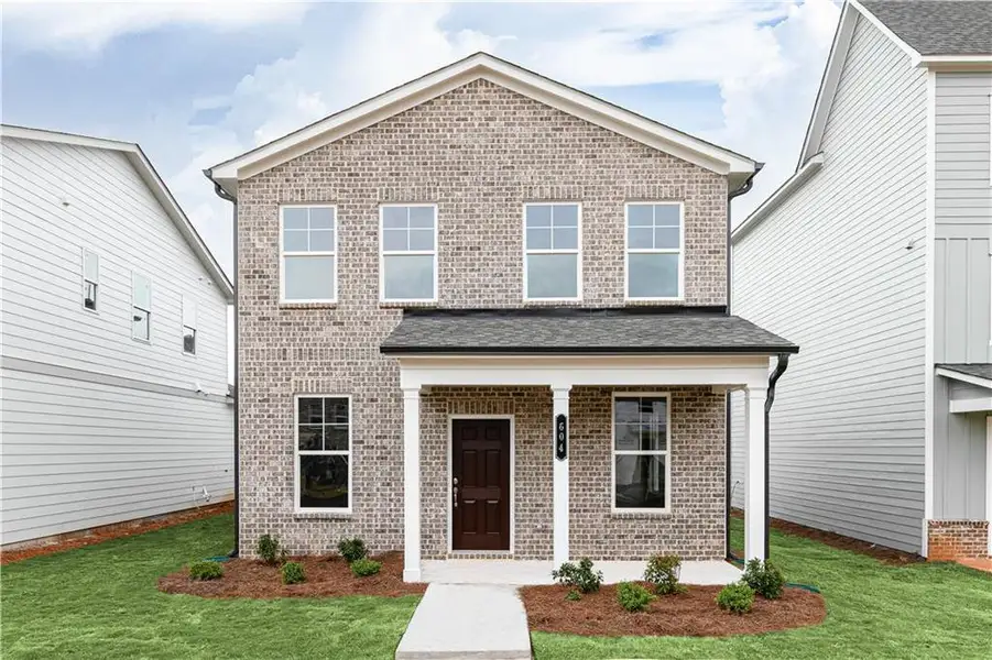 Front exterior of a new home in , Powder Springs, GA, highlighting curb appeal (Image 1). Front exterior of a new home in , Powder Springs, GA, highlighting curb appeal (Image 1).