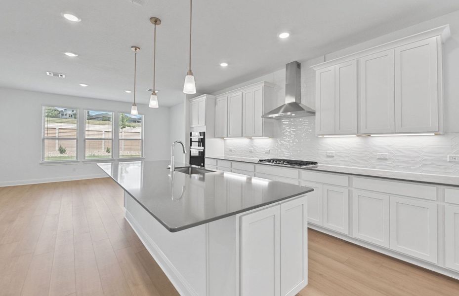 Furnished interior view inside a new home in Bluffview Reserve, Leander (Image 11).
