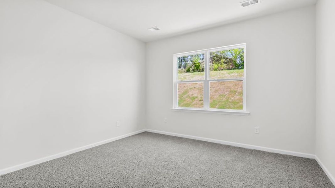 Spacious, unfurnished interior of a new home in Durbin Meadows Traditions, Fountain Inn (Image 25).