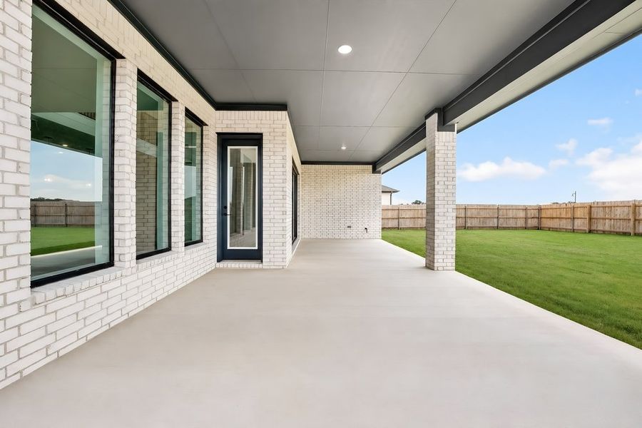 Exterior details and patio area of a home in Santa Rita Ranch, Liberty Hill (Image 3).