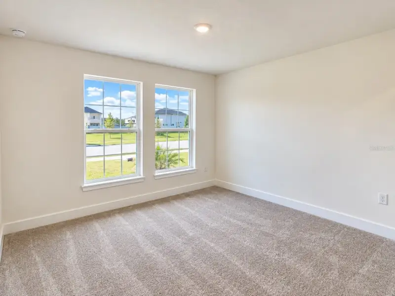 Spacious, unfurnished interior of a new home in Harmony Central, St. Cloud (Image 12).