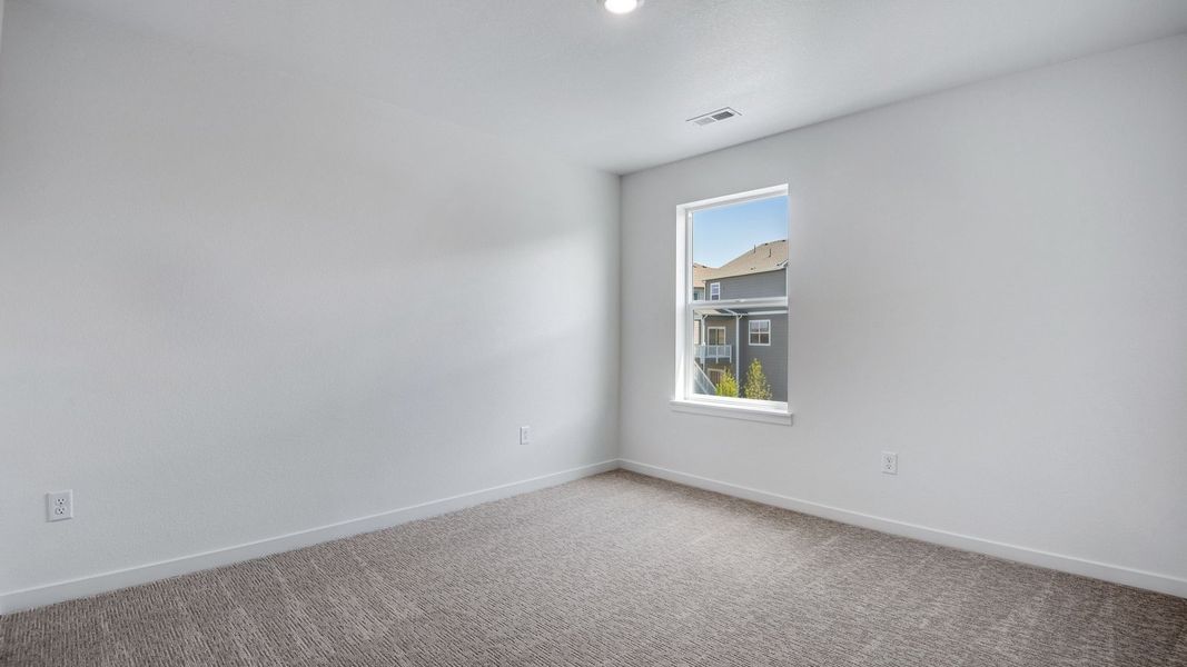 Spacious, unfurnished interior of a new home in Trails at Crowfoot, Parker (Image 43).
