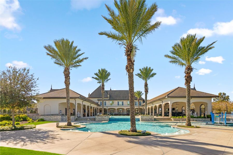 Resort-Style Pool: The stunning central pool area, surrounded by palm trees and cabanas, offers a perfect summer escape.