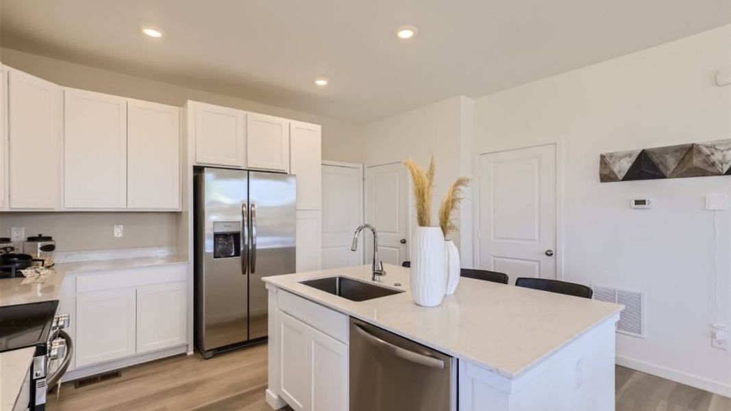 Kitchen center island and fridge