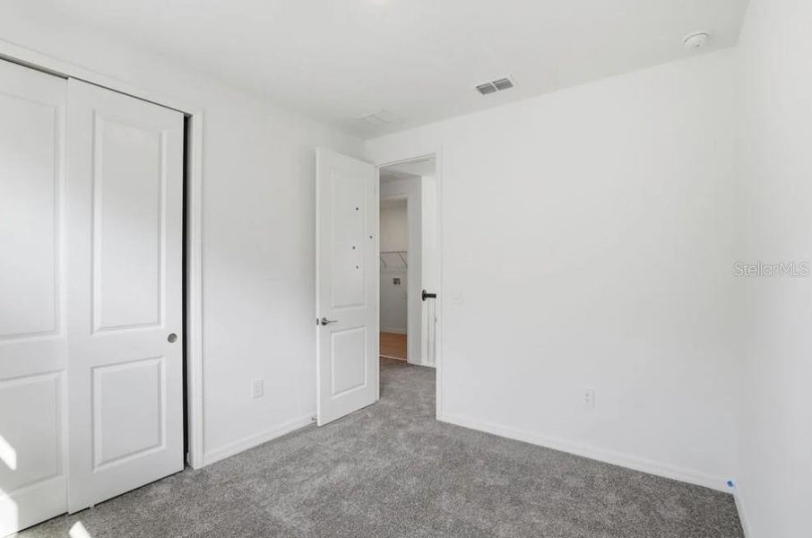 Spacious, unfurnished interior of a new home in Harvest at Ovation, Winter Garden (Image 18). Spacious, unfurnished interior of a new home in Harvest at Ovation, Winter Garden (Image 18).
