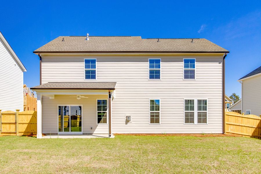 Exterior details and patio area of a home in Pebble Branch, Chapin (Image 20). Exterior details and patio area of a home in Pebble Branch, Chapin (Image 20).