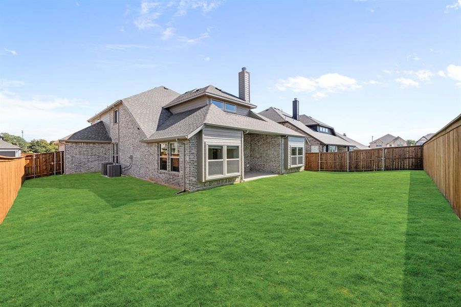 Exterior details and patio area of a home in Mockingbird Hills 60-65, Joshua (Image 3).