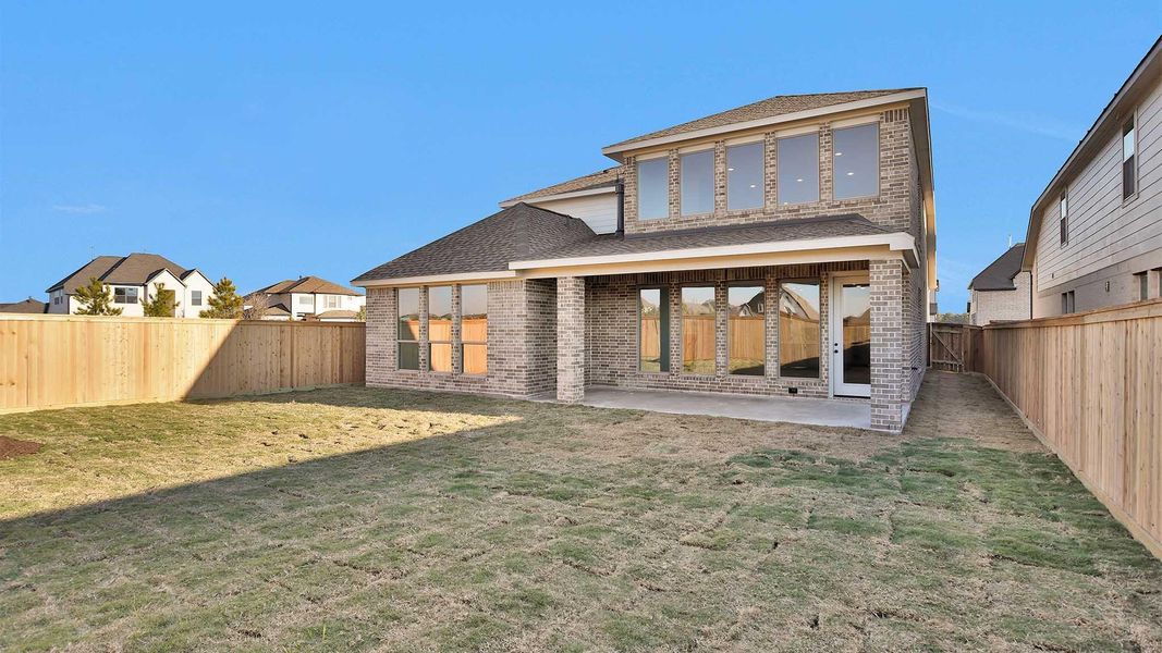 Exterior details and patio area of a home in Bridgeland 50', Cypress (Image 3).