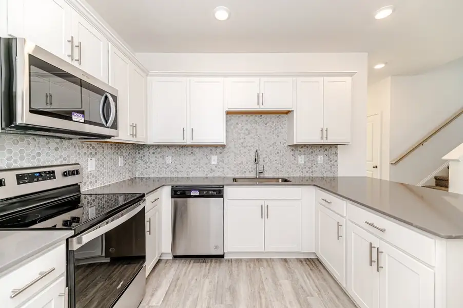 Representative furnished interior of a home built from the Jordan by McKee Homes in Sandy Springs, Aberdeen (Image 6).