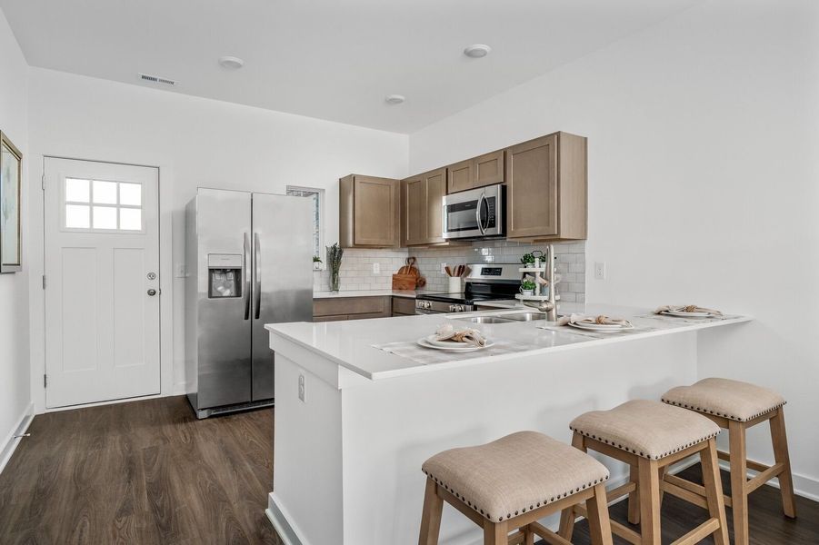Furnished interior view inside a new home in The Towns at Red River, Gallatin (Image 9). Furnished interior view inside a new home in The Towns at Red River, Gallatin (Image 9).