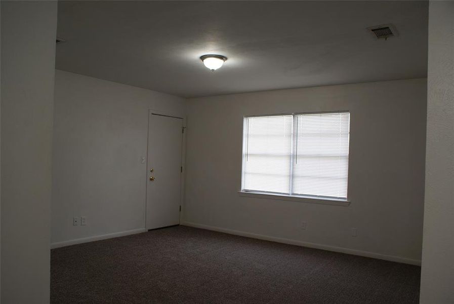 Large room with great natural light. Carpet replaced in late 2025.