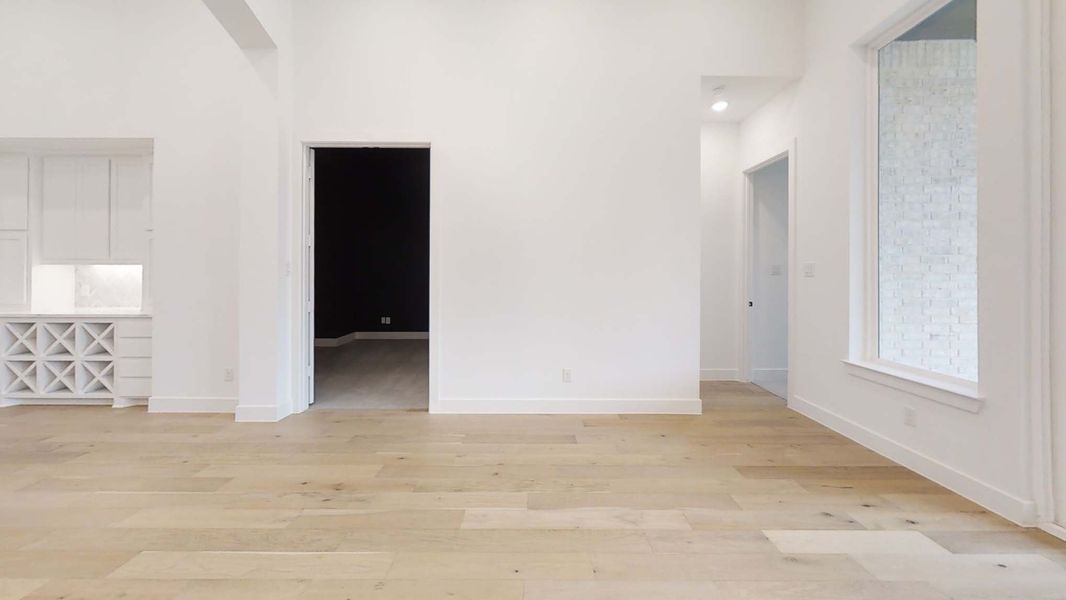 Representative unfurnished interior of a home built from the 281 by Highland Homes in Quail Hollow, Rockwall (Image 35).