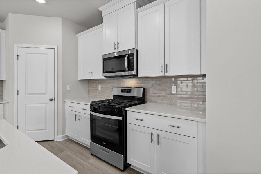 Furnished interior view inside a new home in Waterside - Boardwalk Series, Longs (Image 7). Furnished interior view inside a new home in Waterside - Boardwalk Series, Longs (Image 7).