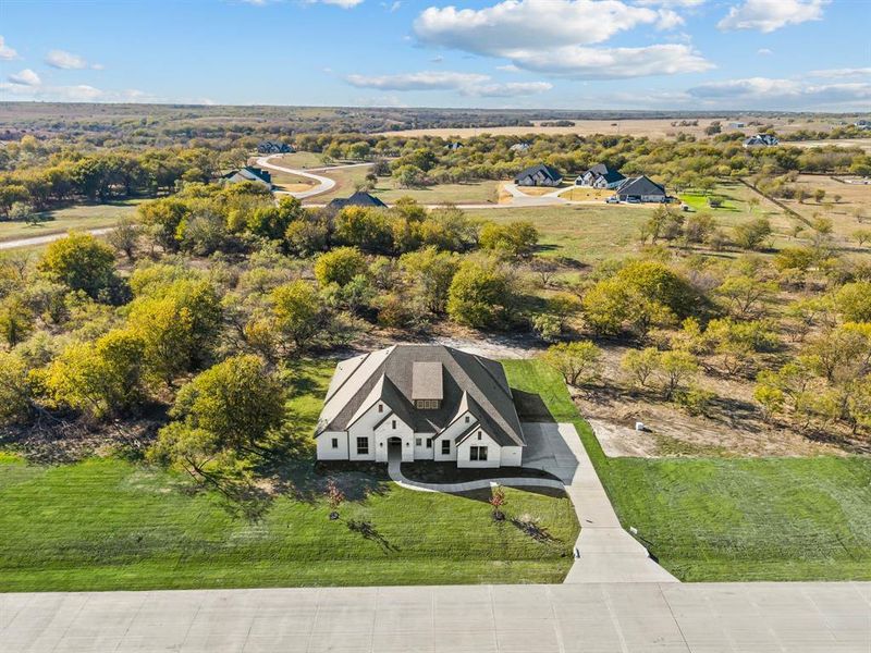 Front exterior of a new home in Rolling Creek Ranch, Aledo, TX, highlighting curb appeal (Image 28).