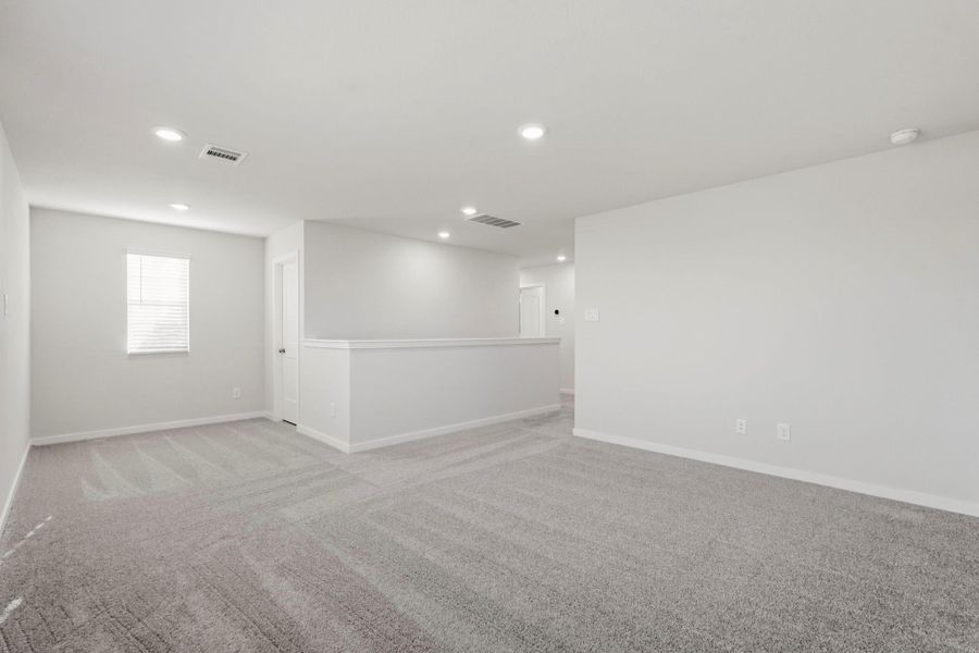Spacious, unfurnished interior of a new home in Paloma at Sanford Farms, Waller (Image 16).