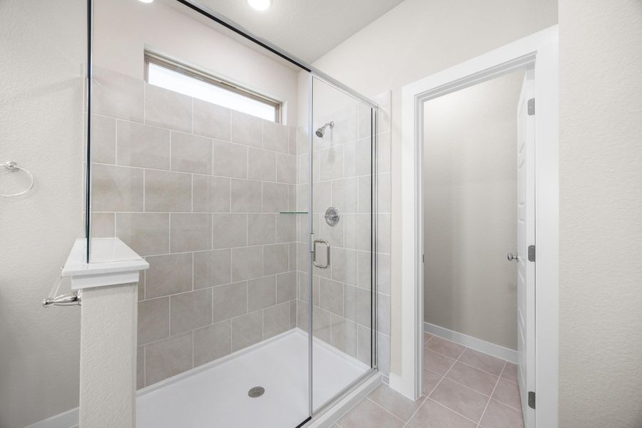 Primary Bath in the Elm home plan by Trophy Signature Homes – REPRESENTATIVE PHOTO Primary Bath in the Elm home plan by Trophy Signature Homes – REPRESENTATIVE PHOTO