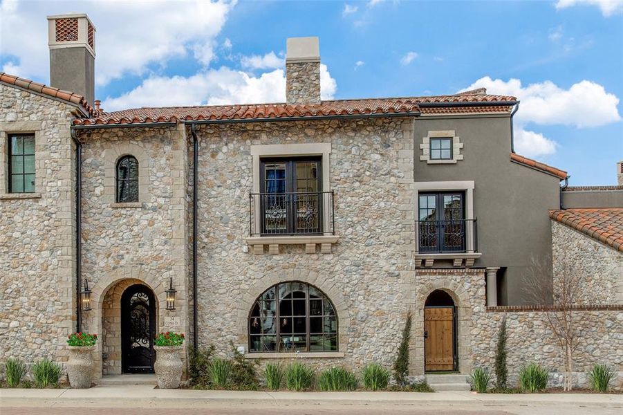 Mediterranean / spanish home with a balcony