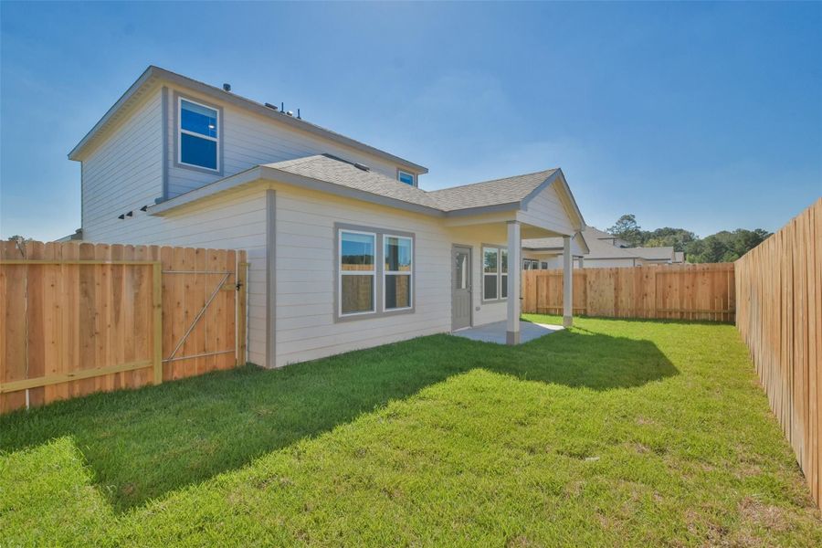 Front exterior of a new home in The Villages at WestPointe, Dayton, TX, highlighting curb appeal (Image 85).