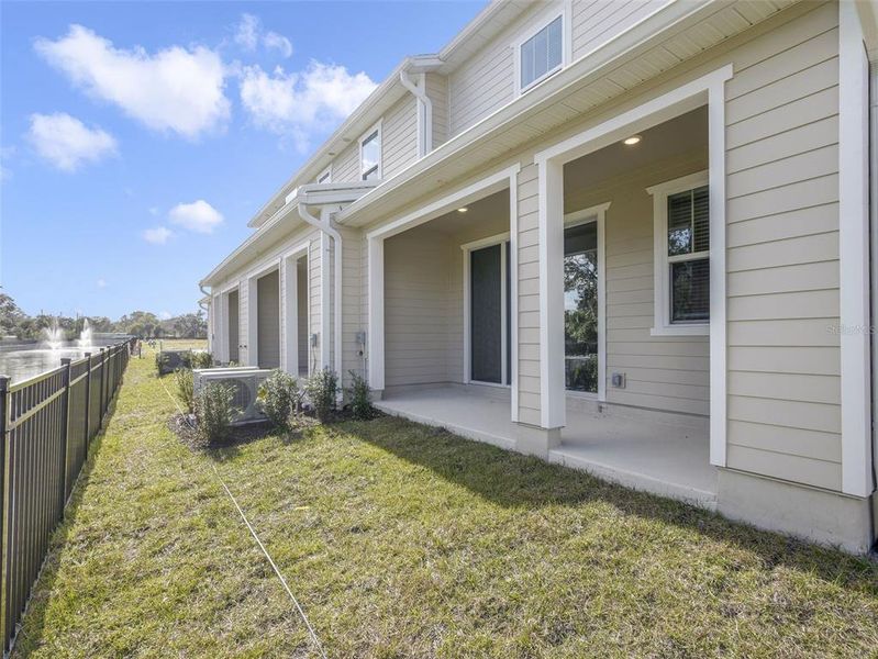 Exterior details and patio area of a home in Towns at Riverwalk, Sanford (Image 3). Exterior details and patio area of a home in Towns at Riverwalk, Sanford (Image 3).