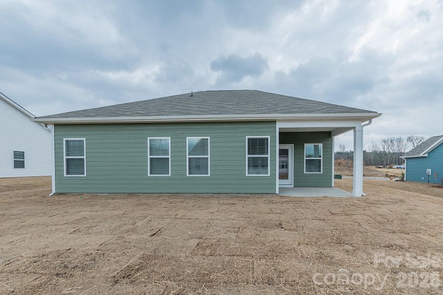 Exterior details and patio area of a home in Pine Bluff, Midland (Image 19). Exterior details and patio area of a home in Pine Bluff, Midland (Image 19).