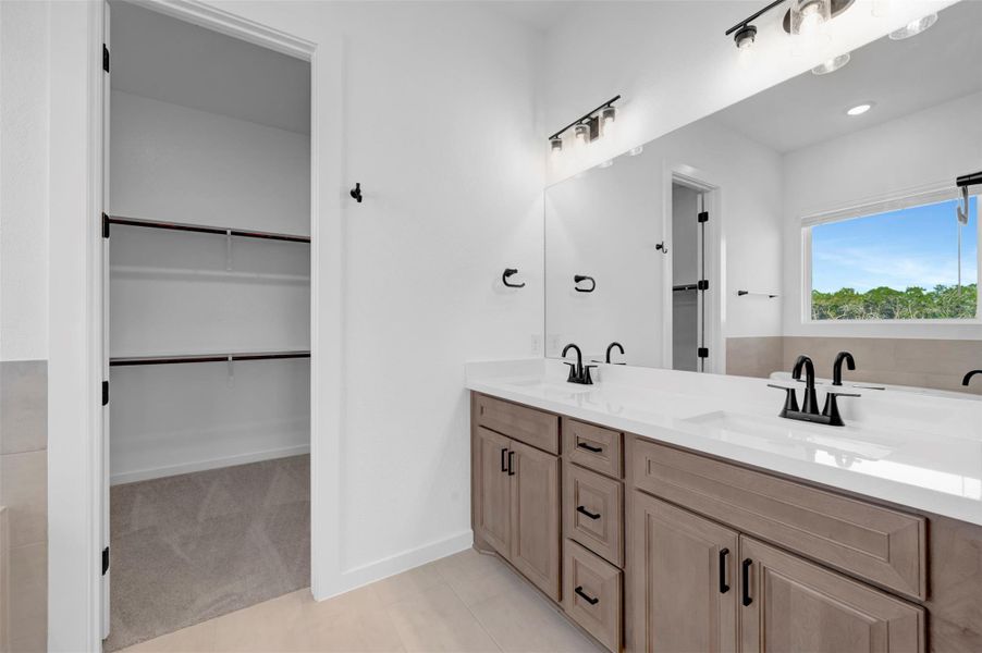 Furnished interior view inside a new home in Heritage, Dripping Springs (Image 14).