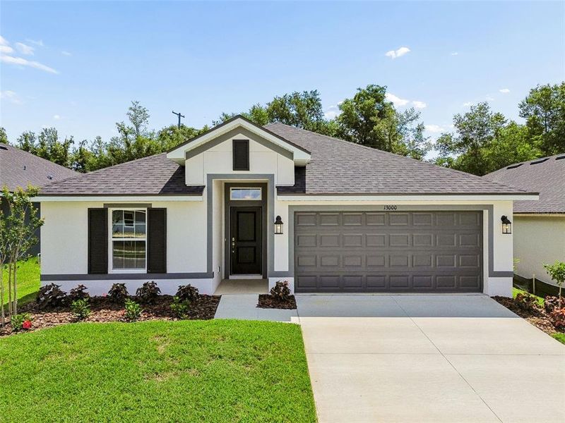 Front exterior of a new home in Abbey Glen, Dade City, FL, highlighting curb appeal (Image 30). Front exterior of a new home in Abbey Glen, Dade City, FL, highlighting curb appeal (Image 30).