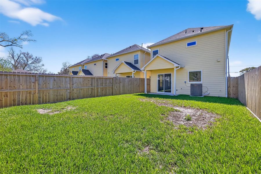 Exterior details and patio area of a home in , Houston (Image 3).