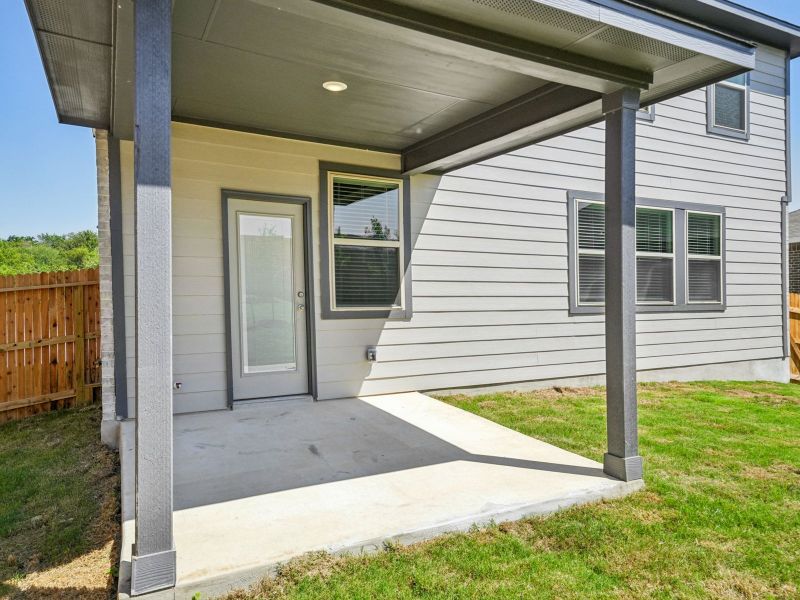 Back exterior of the Red River floorplan at a Meritage Homes community.