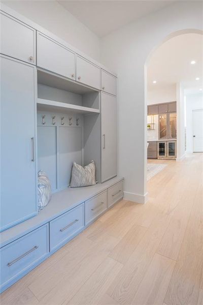 Mudroom with light wood-type flooring