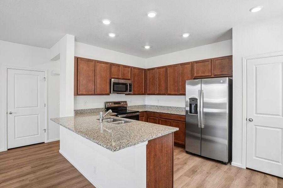 Furnished interior view inside a new home in Windler, Aurora (Image 4).