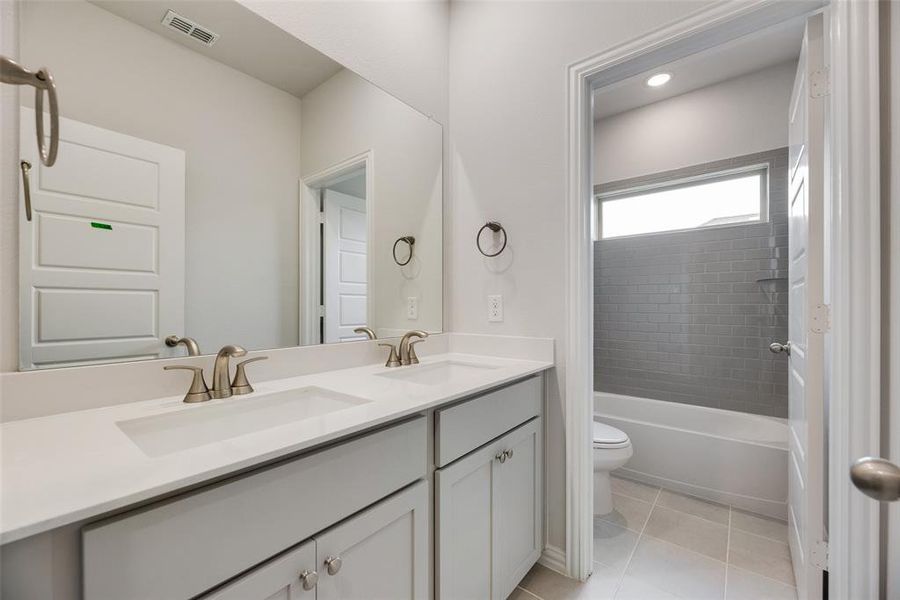 Furnished interior view inside a new home in Spiritas Ranch, Little Elm (Image 8). Furnished interior view inside a new home in Spiritas Ranch, Little Elm (Image 8).