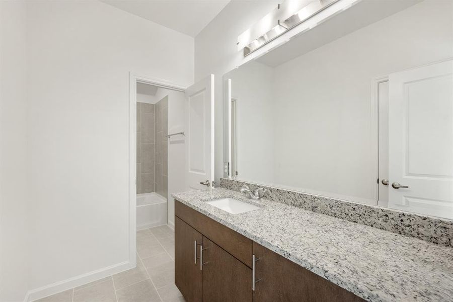 Furnished interior view inside a new home in East Oak Creek Elements, Commerce (Image 10).