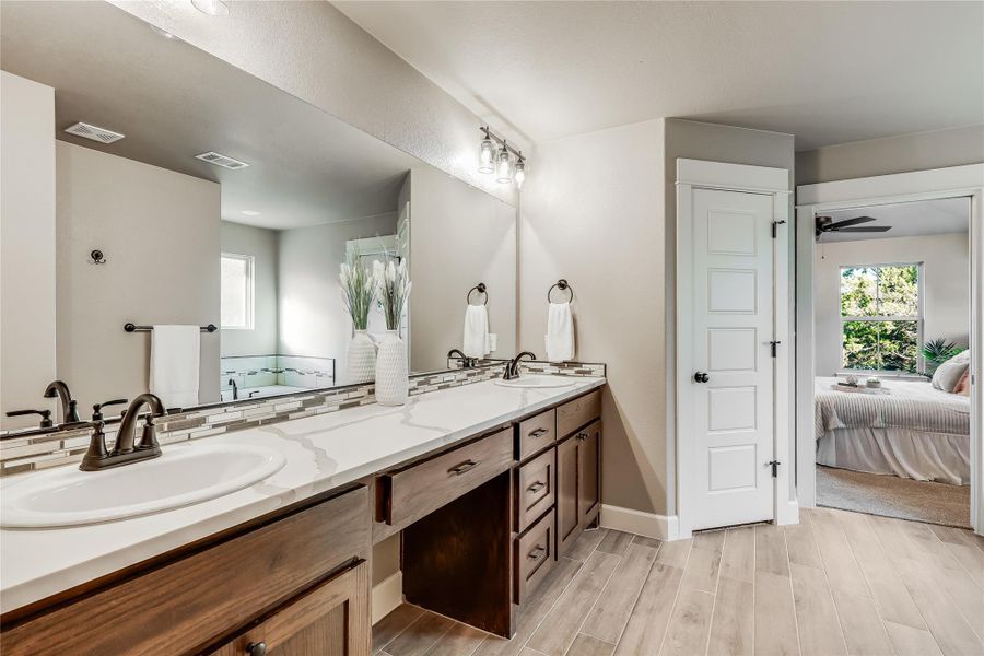 The offset water closet has the funnest tile in the home- also, provides extra space