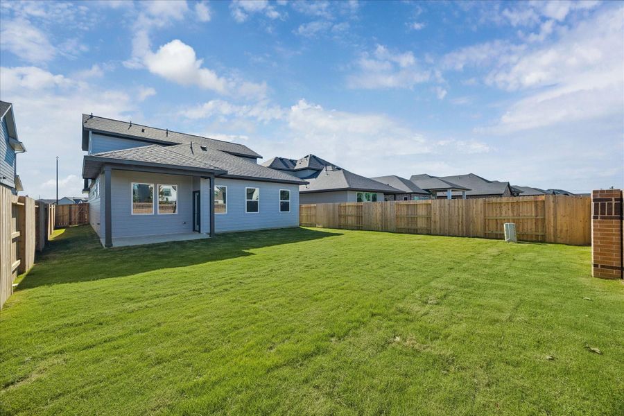 Exterior details and patio area of a home in Elyson, Katy (Image 4).