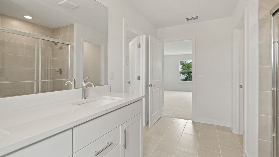 Highbourne Second Floor Primary en Suite Bath by DRB Homes in Willowbrook North located in Winter Haven, FL. Highbourne Second Floor Primary en Suite Bath by DRB Homes in Willowbrook North located in Winter Haven, FL.