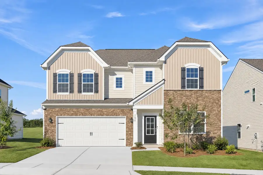 Front exterior of a new home in Shannon Woods, Maiden, NC, highlighting curb appeal (Image 1). Front exterior of a new home in Shannon Woods, Maiden, NC, highlighting curb appeal (Image 1).