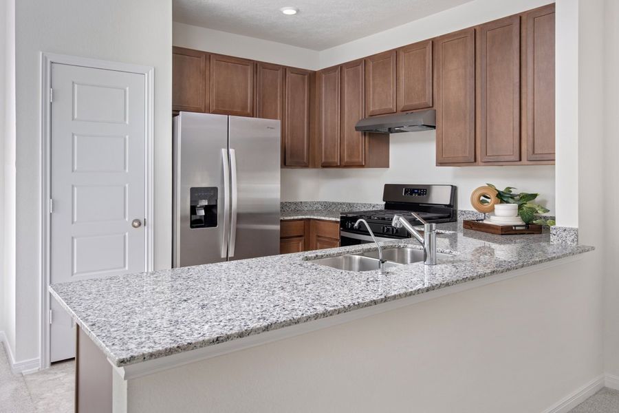 Representative furnished interior of a home built from the Plan 1271 Modeled by KB Home in Sunset Grove South, Hitchcock (Image 5).