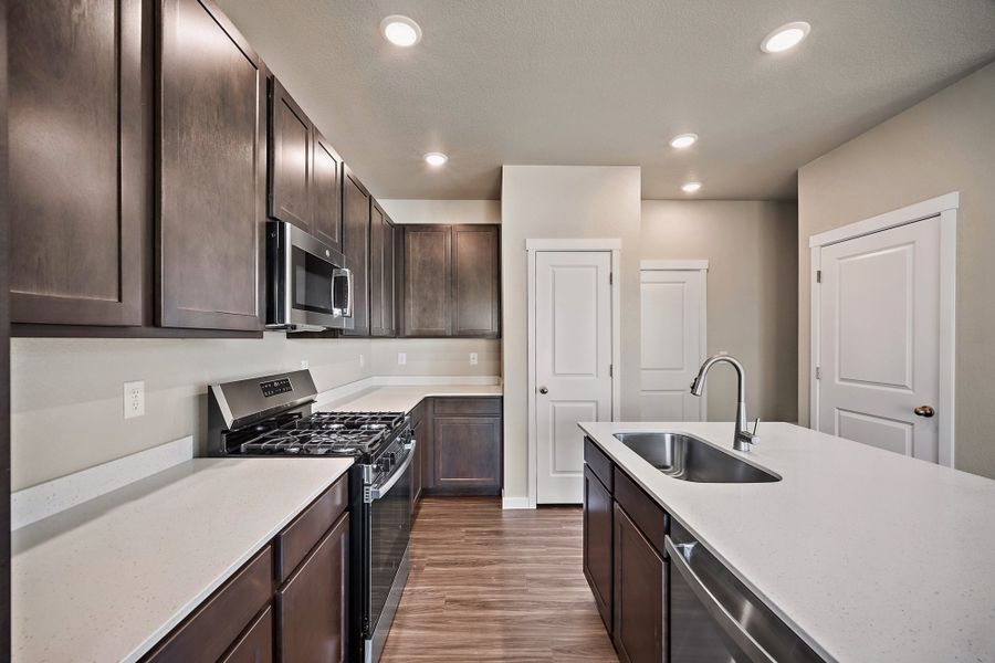 Furnished interior view inside a new home in Ridge at Lorson Ranch, Colorado Springs (Image 6).