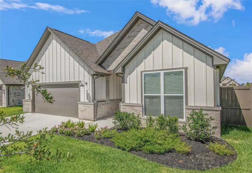 Front exterior of a new home in , Bryan, TX, highlighting curb appeal (Image 1). Front exterior of a new home in , Bryan, TX, highlighting curb appeal (Image 1).