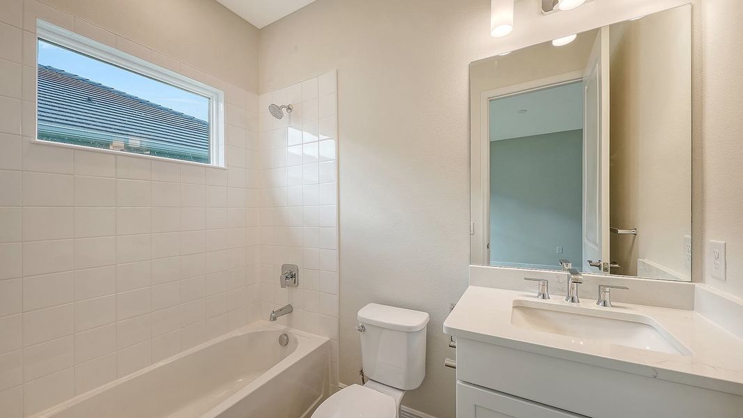 Furnished interior view inside a new home in Grand Park Real Estate and Homes for Sale in Sarasota, FL - Neal Communities, Sarasota (Image 13).