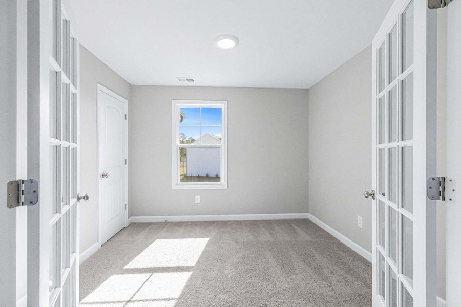 Representative unfurnished interior of a home built from the Aberdeen by Caviness & Cates Communities in Bartlett Manor, Youngsville (Image 170).
