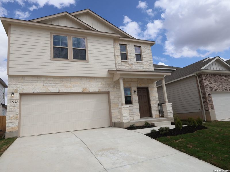 Front exterior of a new home in Park Place, New Braunfels, TX, highlighting curb appeal (Image 20).